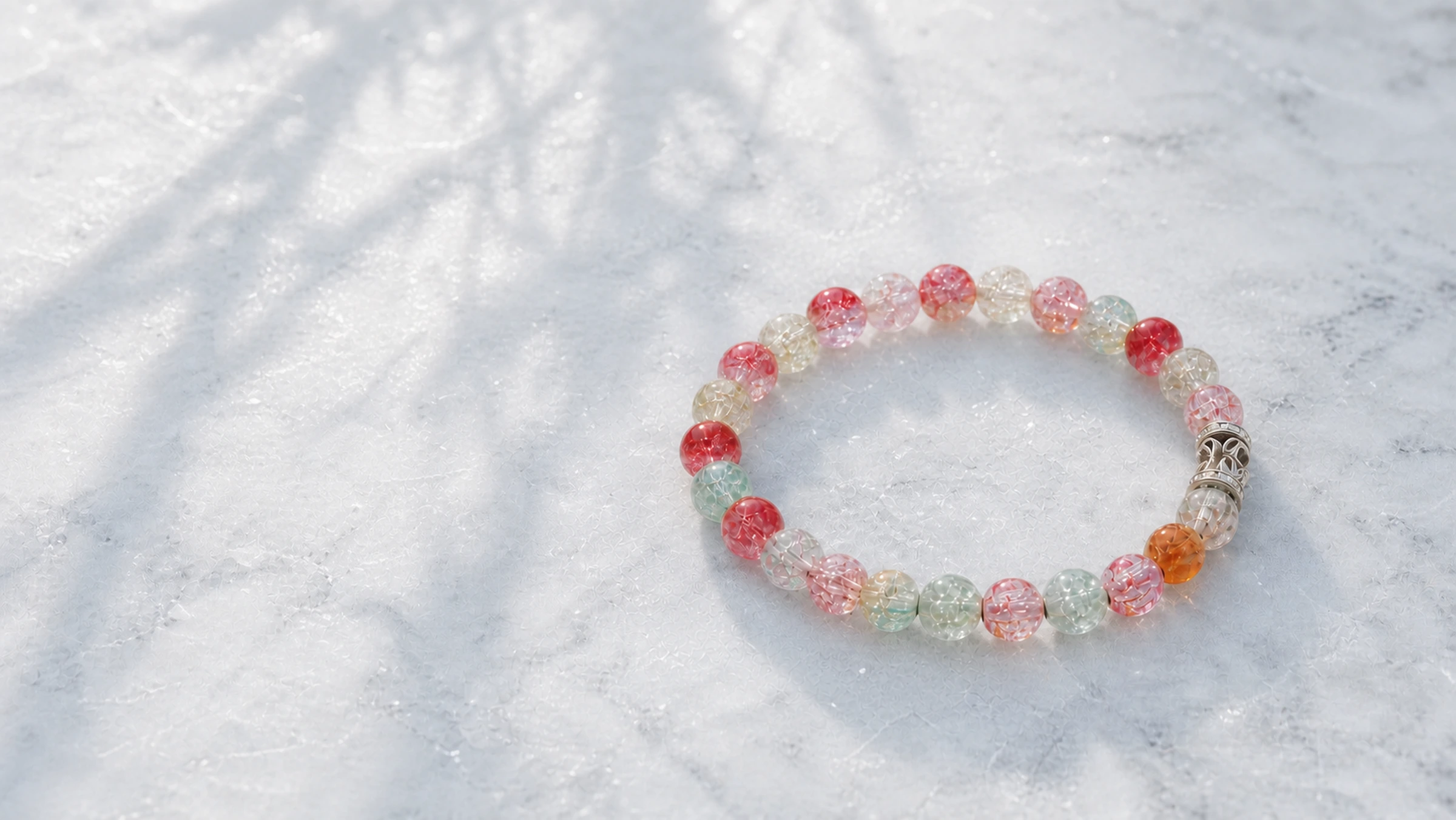 SIVERA multicolored bead bracelet on white marble in Siberian morning light